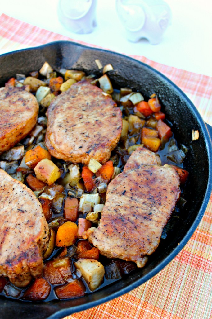 Pork Chops with Glazed Apples and Vegetables ~ Pan seared, thick cut pork chops oven roasted with apples, leeks, fennel, and butternut squash glazed in a herb brown sugar sauce ~ The Complete Savorist