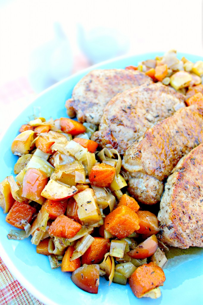 Pork Chops with Glazed Apples and Vegetables ~ Pan seared, thick cut pork chops oven roasted with apples, leeks, fennel, and butternut squash glazed in a herb brown sugar sauce ~ The Complete Savorist