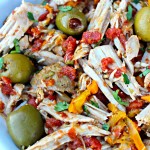 Latin Style Pork Roast ~ Tender Pork Loin Roast slow cooked with warming spices, onions, bell peppers, diced tomatoes, capers, and pimento stuffed green olives ~ The Complete Savorist